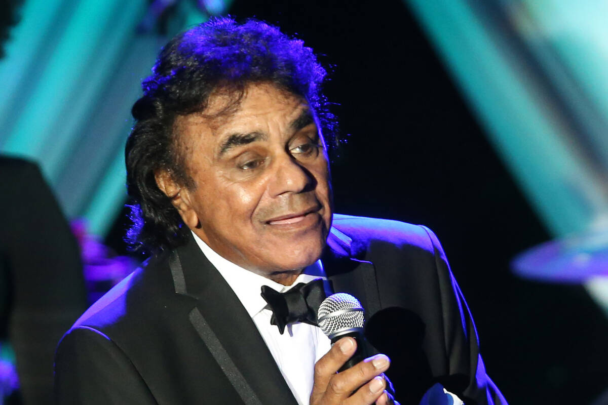 Johnny Mathis performs on stage the 2015 Clive Davis Pre-Grammy Gala show at the Beverly Hilton ...