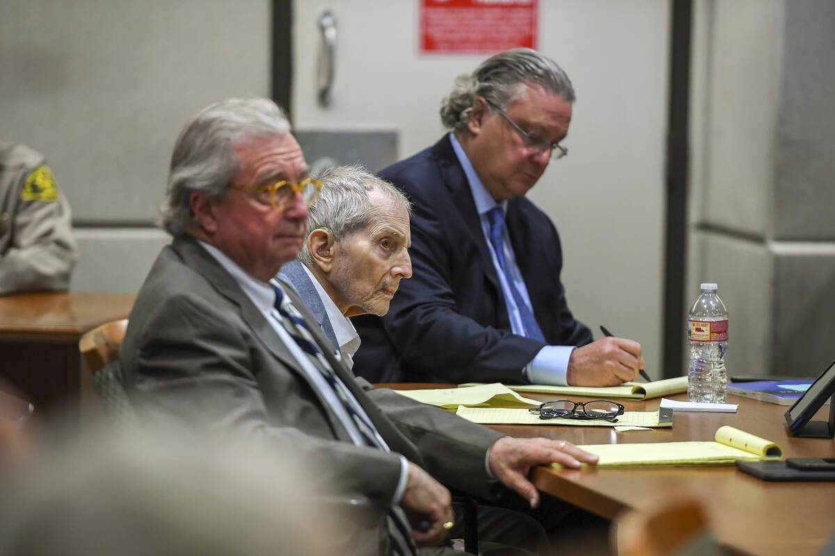 FIn this March 5, 2020, file photo real estate heir Robert Durst, middle, sits with his defense ...