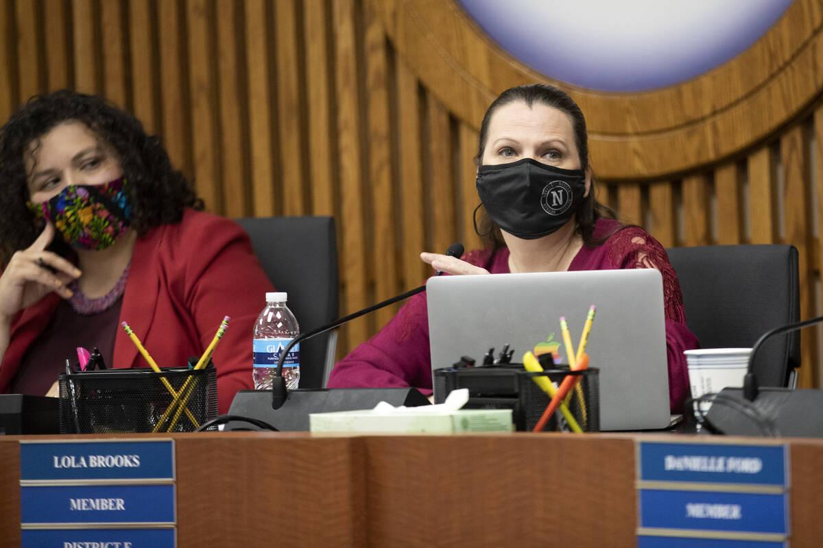 CCSD Board of Trustees member Lola Brooks, right, discusses the appointment process of an inter ...