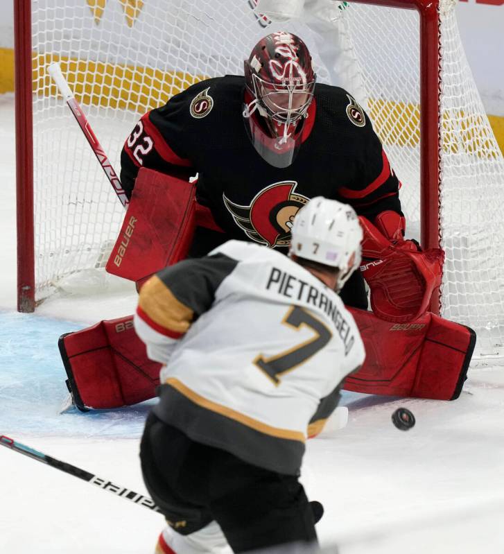 Vegas Golden Knights defenseman Alex Pietrangelo shoots on Ottawa Senators goalie Filip Gustavs ...