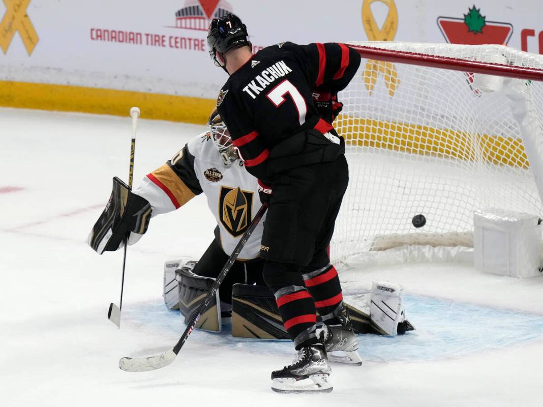 Ottawa Senators left wing Brady Tkachuk tips the puck past Vegas Golden Knights goaltender Robi ...