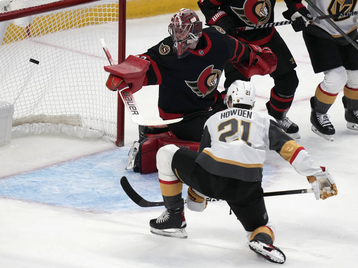 Vegas Golden Knights center Brett Howden watches his deflection sail past Ottawa Senators goali ...