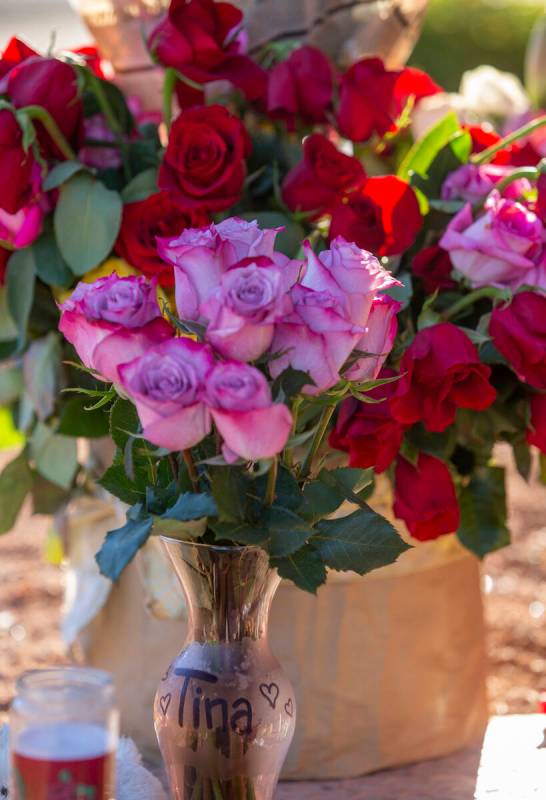 Flowers for Tina Tintor at a roadside memorial on Thursday, Nov. 4, 2021, near the site where s ...