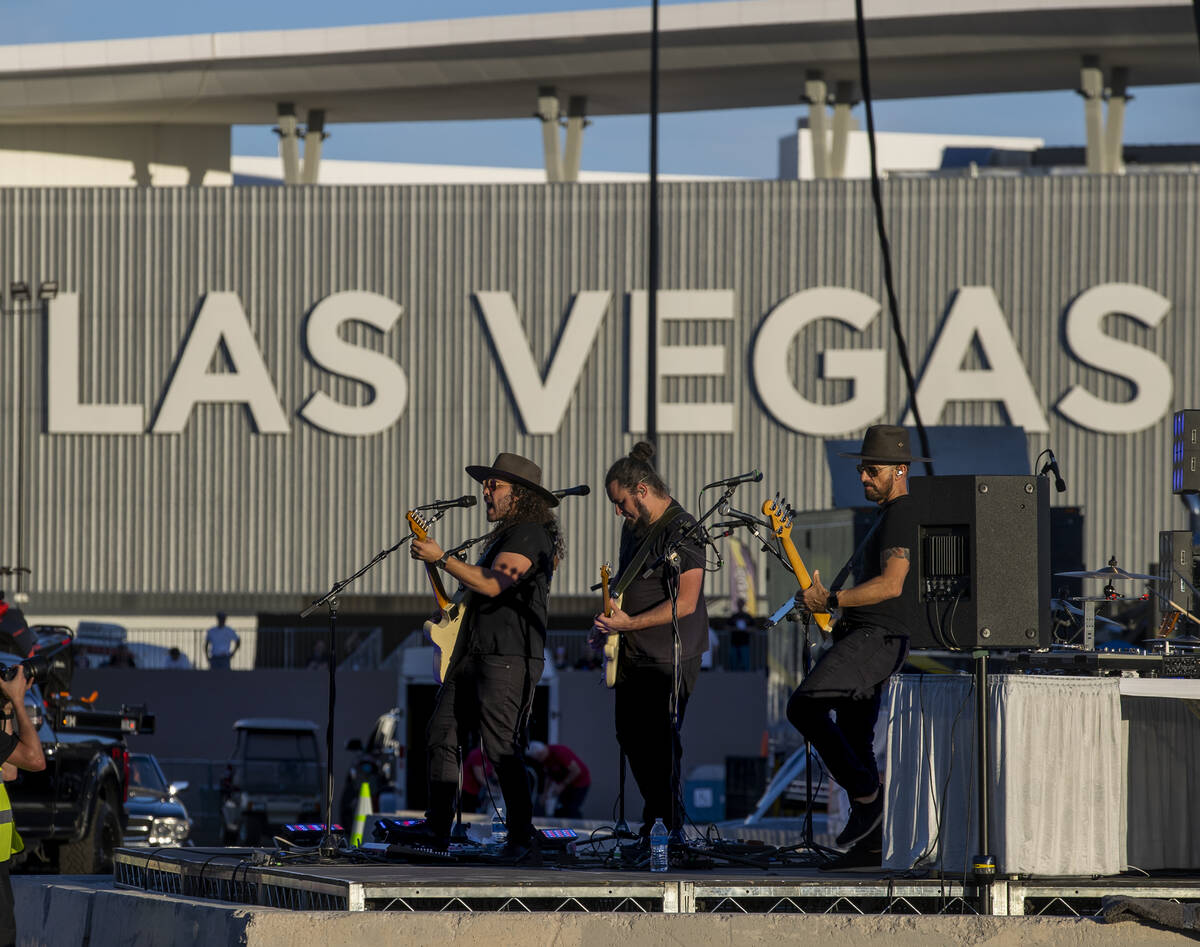 The band plays on as the car Cruise rolls by during the car Cruise at SEMA Ignited from the Las ...