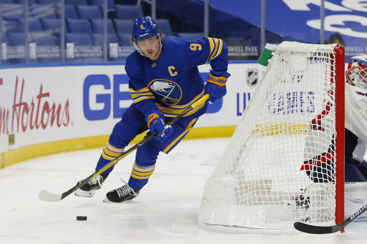 Buffalo Sabres forward Jack Eichel carries the puck during the second period of the team's NHL ...