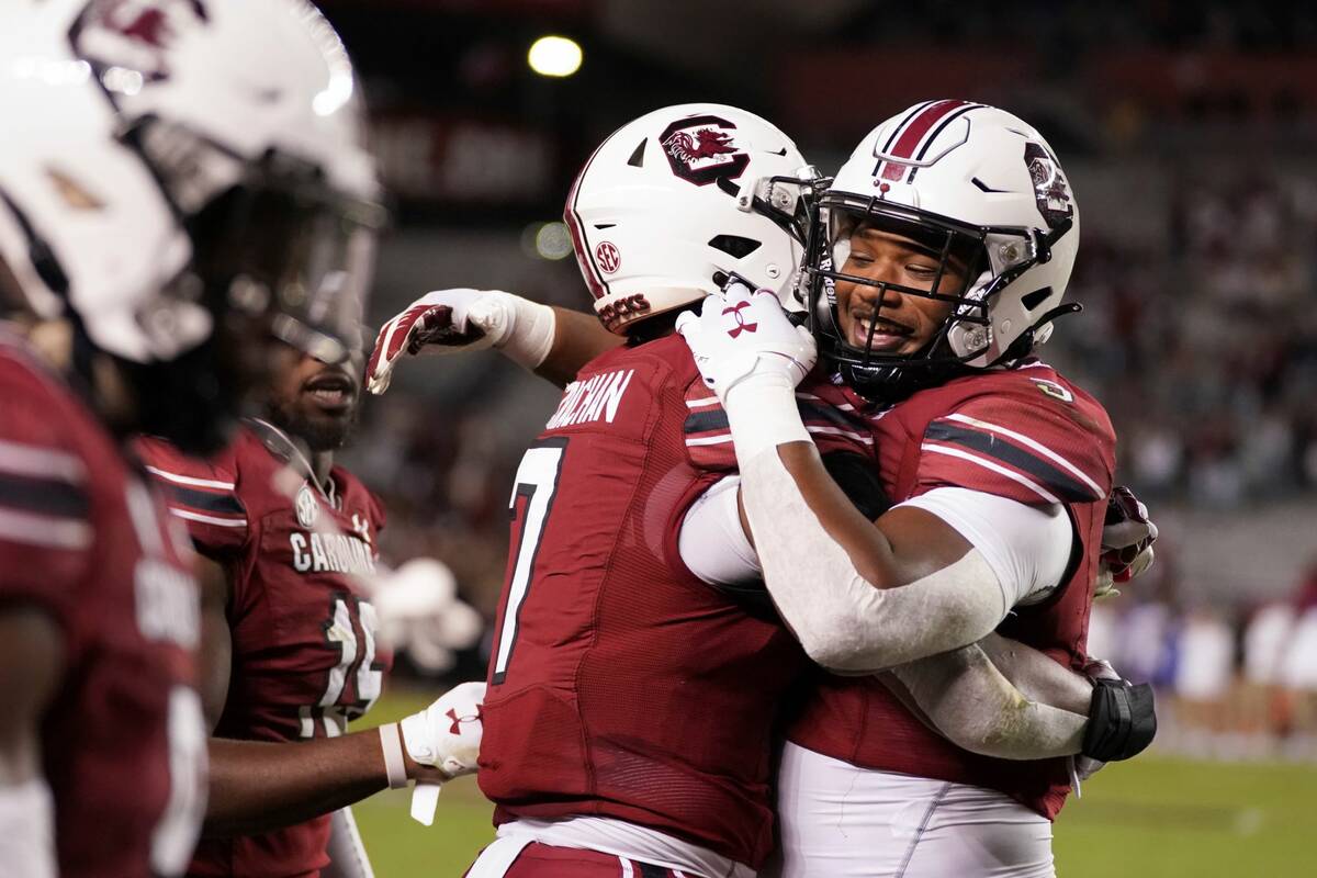 South Carolina's Jordan Burch (3) and Jordan Strachan (7) celebrate a play during the second ha ...