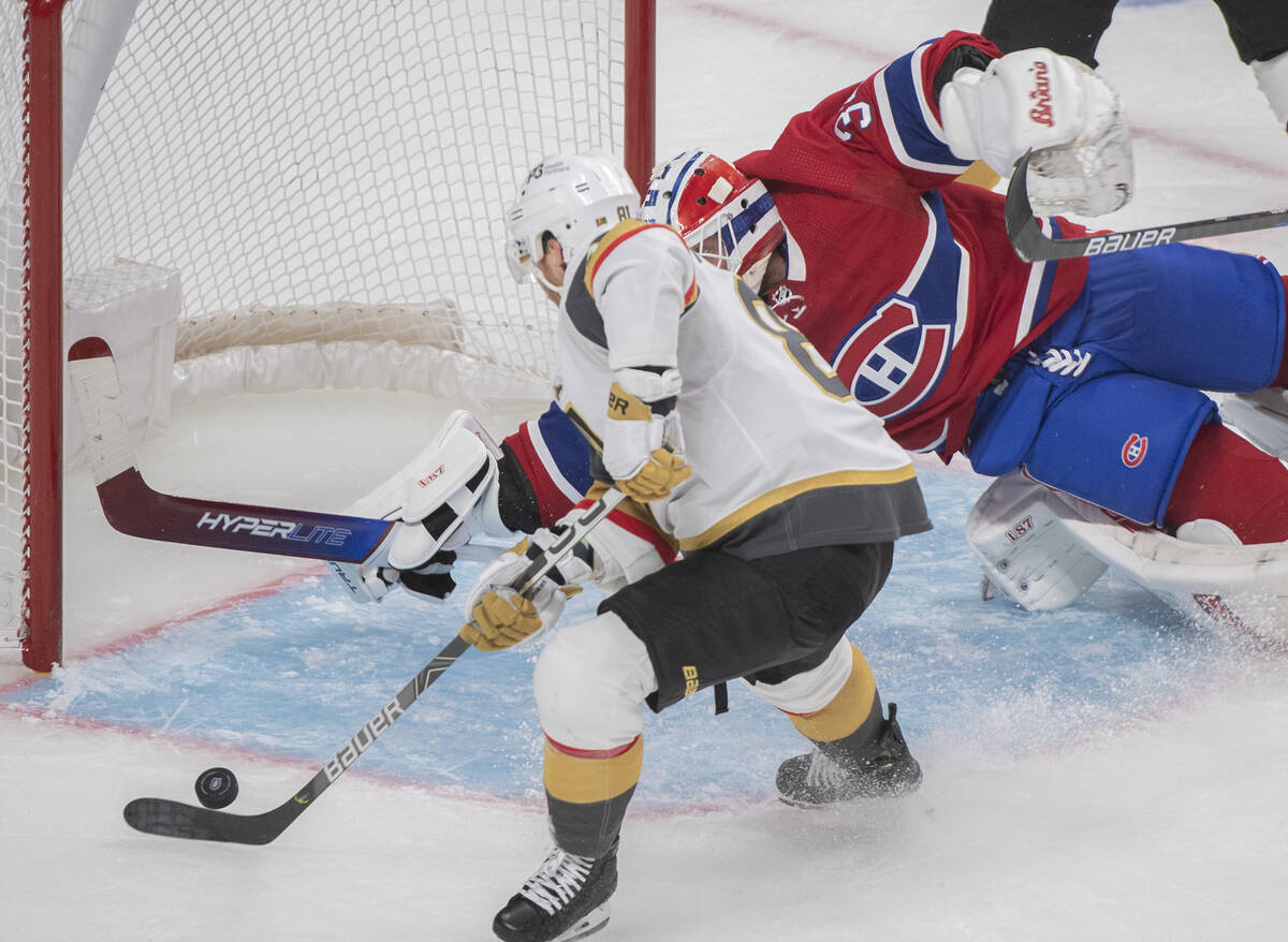 Vegas Golden Knights' Jonathan Marchessault scores against Montreal Canadiens goaltender Jake A ...