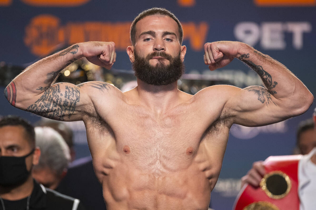 Caleb Plant poses during a weigh-in at the MGM Grand Garden Arena in Las Vegas, Friday, Nov. 5, ...