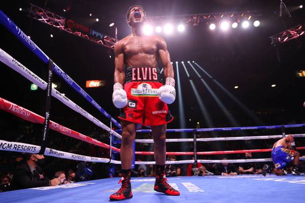Elvis Rodriguez reacts after his knockout win against Juan Pablo Romero in the fifth round of a ...