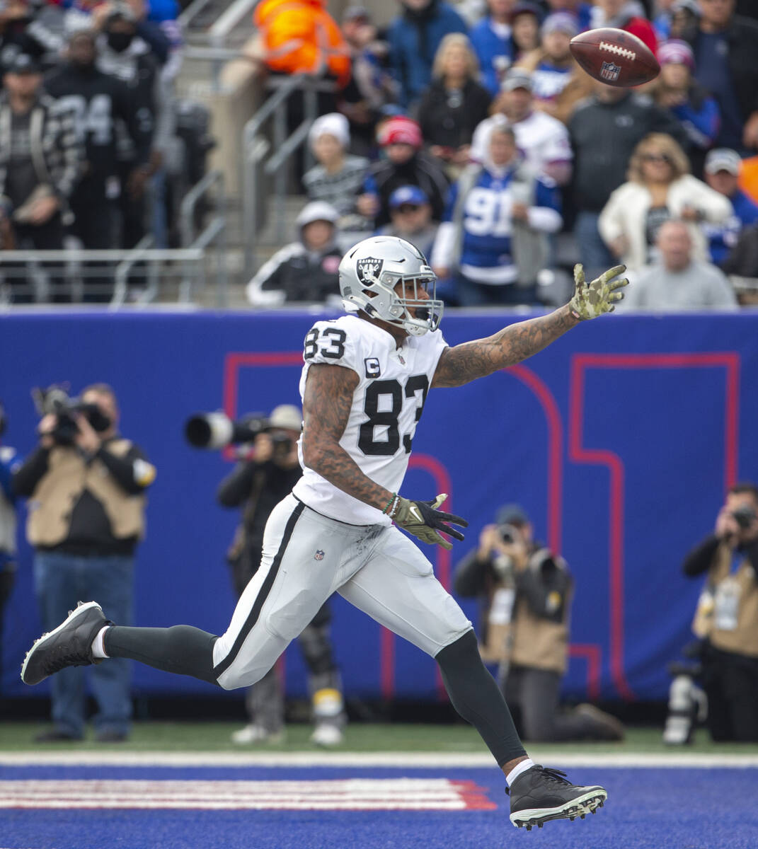 Las Vegas Raiders tight end Darren Waller (83) is overthrown in the end zone during the second ...