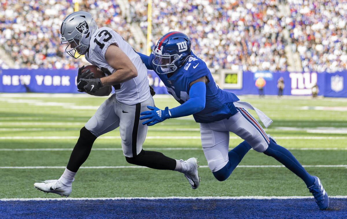 Las Vegas Raiders wide receiver Hunter Renfrow (13) catches a touchdown past New York Giants co ...