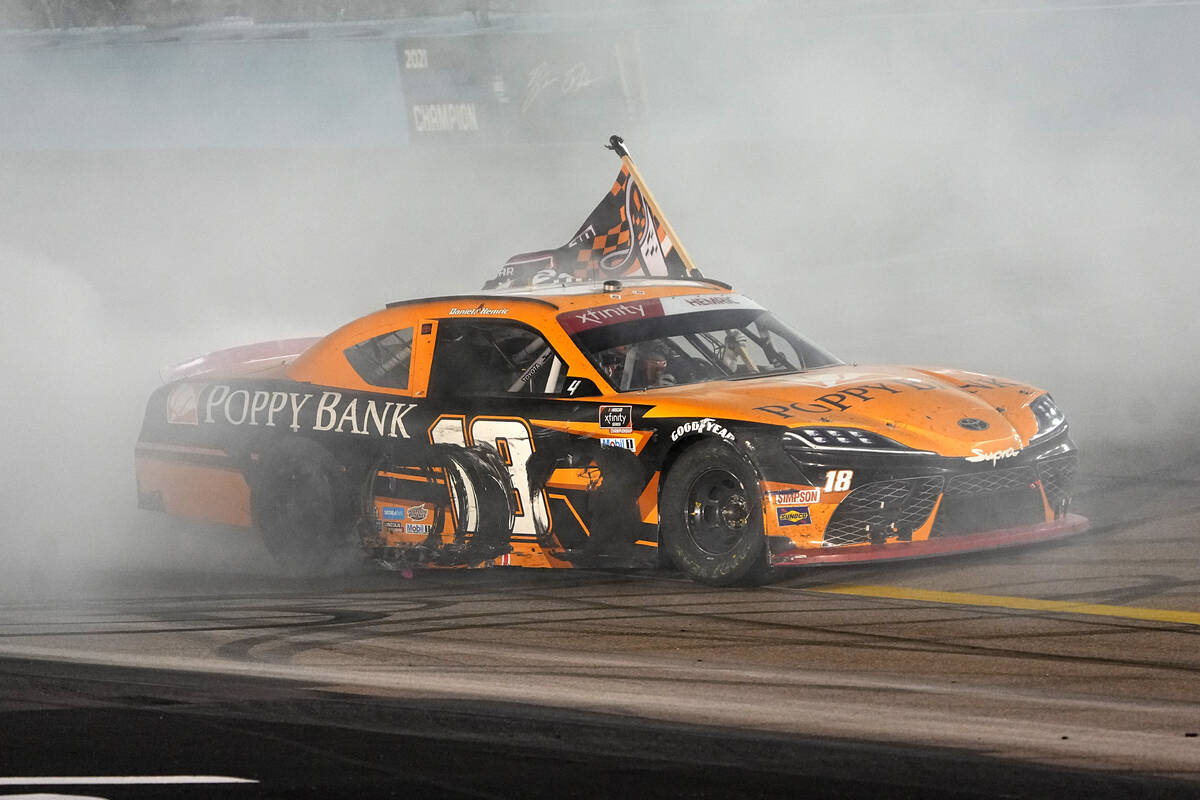 Daniel Hemric celebrates after winning the NASCAR Xfinity Series auto race Saturday, Nov. 6, 20 ...