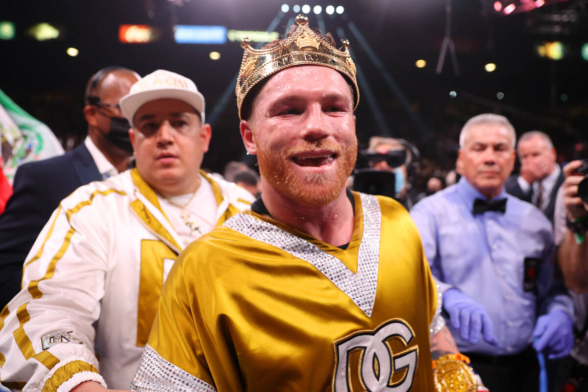 Saul “Canelo” Alvarez celebrates his 11th round knockout win against Caleb Plant ...