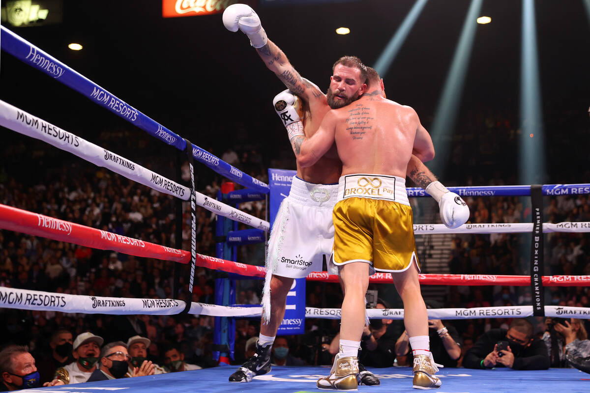 Caleb Plant, left, battles Saul “Canelo” Alvarez in the ninth round of a super mi ...