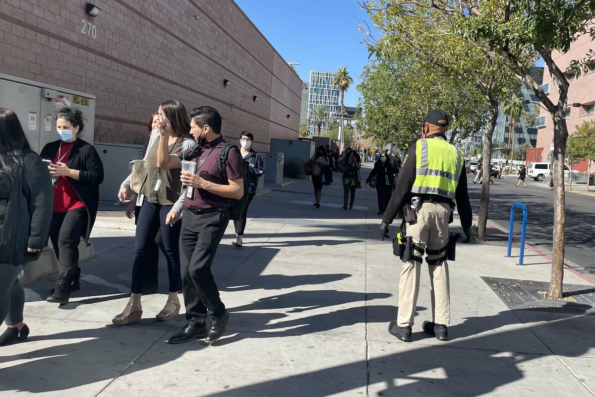 People leave the Regional Justice Center in downtown Las Vegas on Monday, Nov. 8, 2021, after a ...