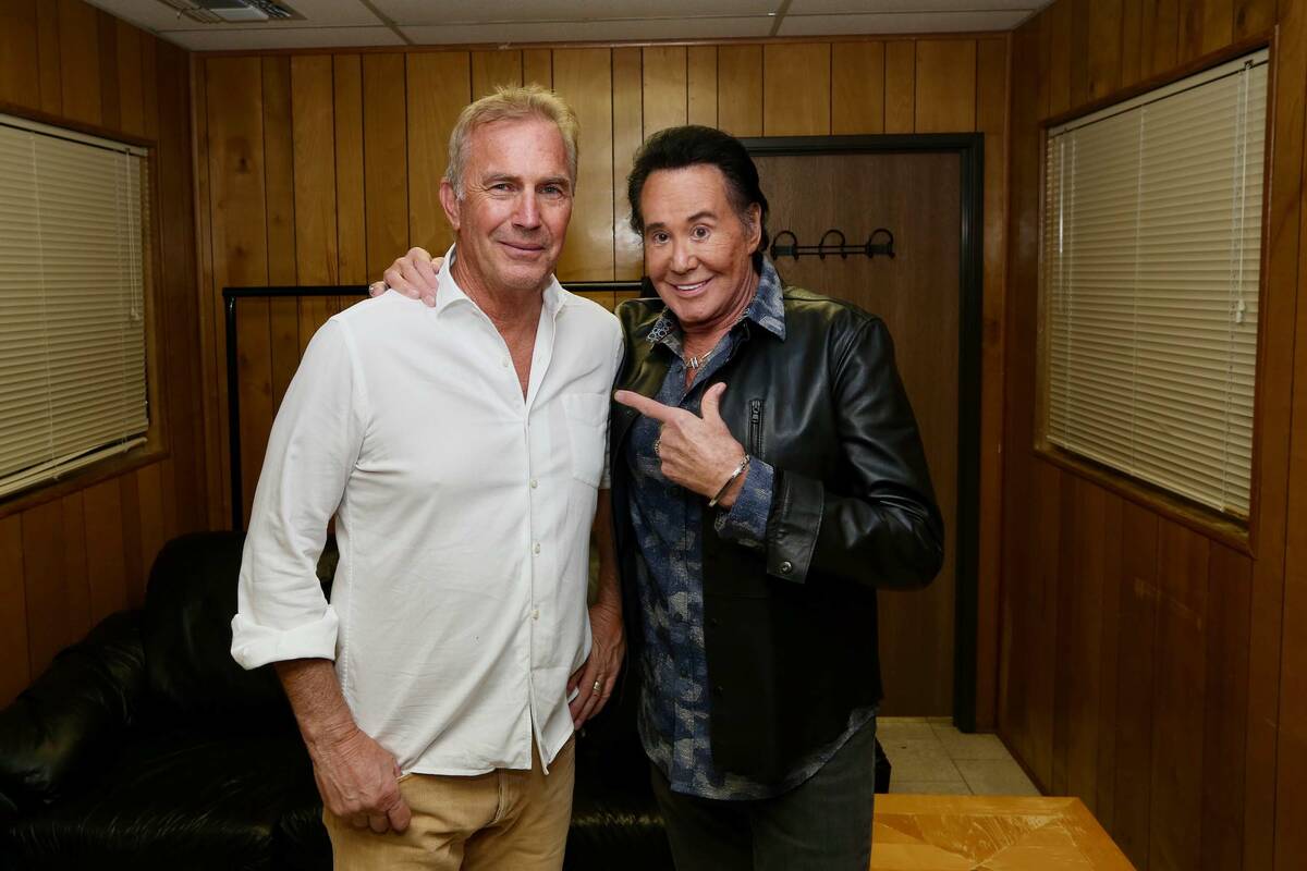 Kevin Costner and Wayne Newton are shown backstage at Sunset Station Amphitheater on Saturday, ...
