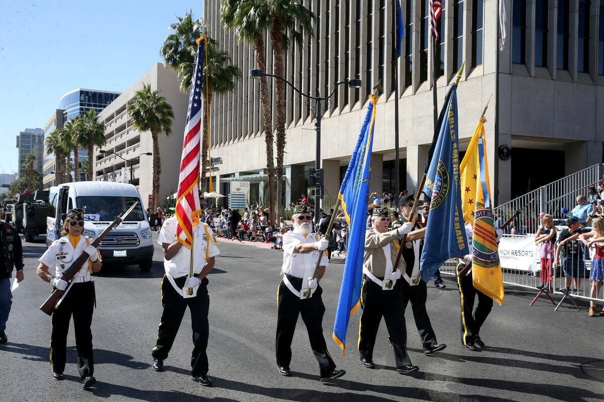 A color guard during the Veterans Day Parade in downtown Las Vegas Monday, Nov. 11, 2019. (K.M. ...