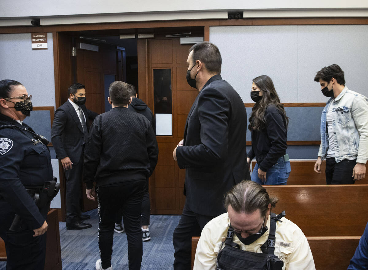 Relatives of victim Tina Tintor walk out of the courtroom at the Regional Justice Center on Wed ...