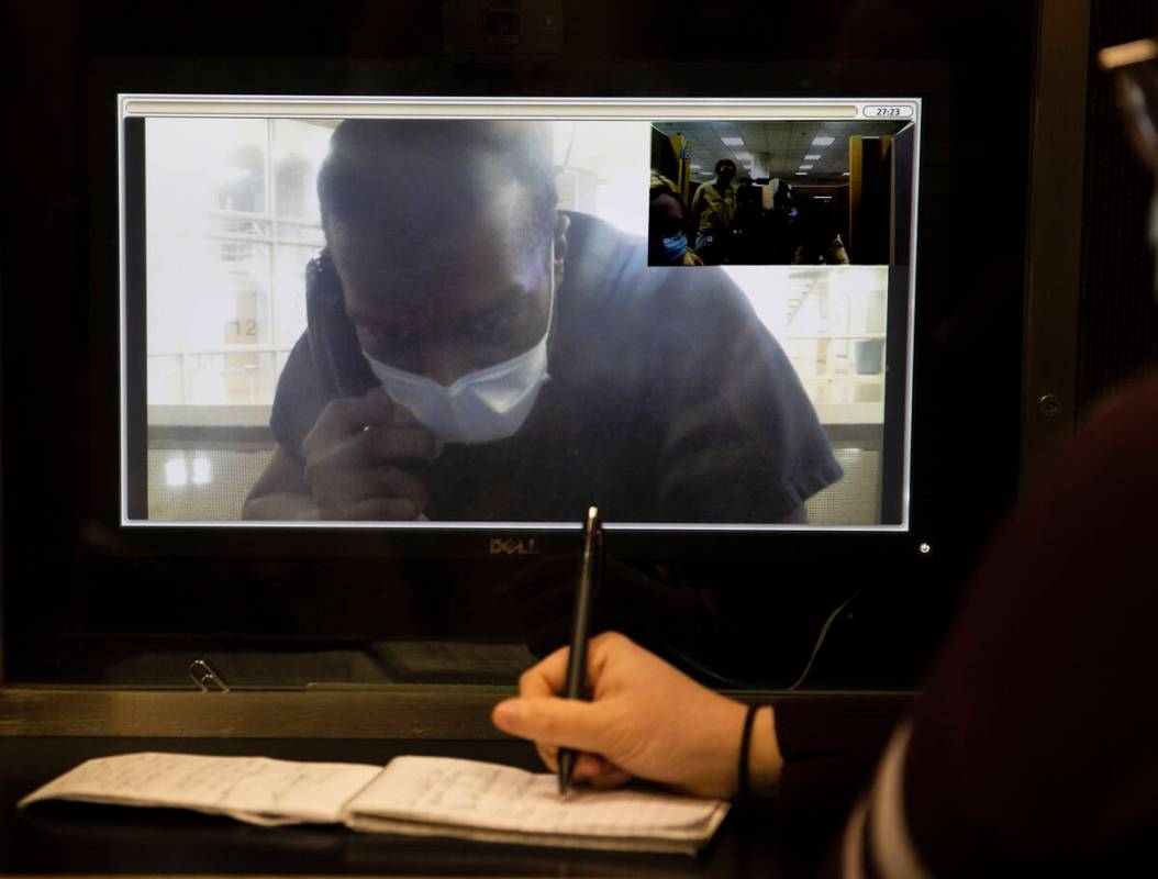 Willis Davis conducts an interview via video chat from the Clark County Detention Center on Wed ...