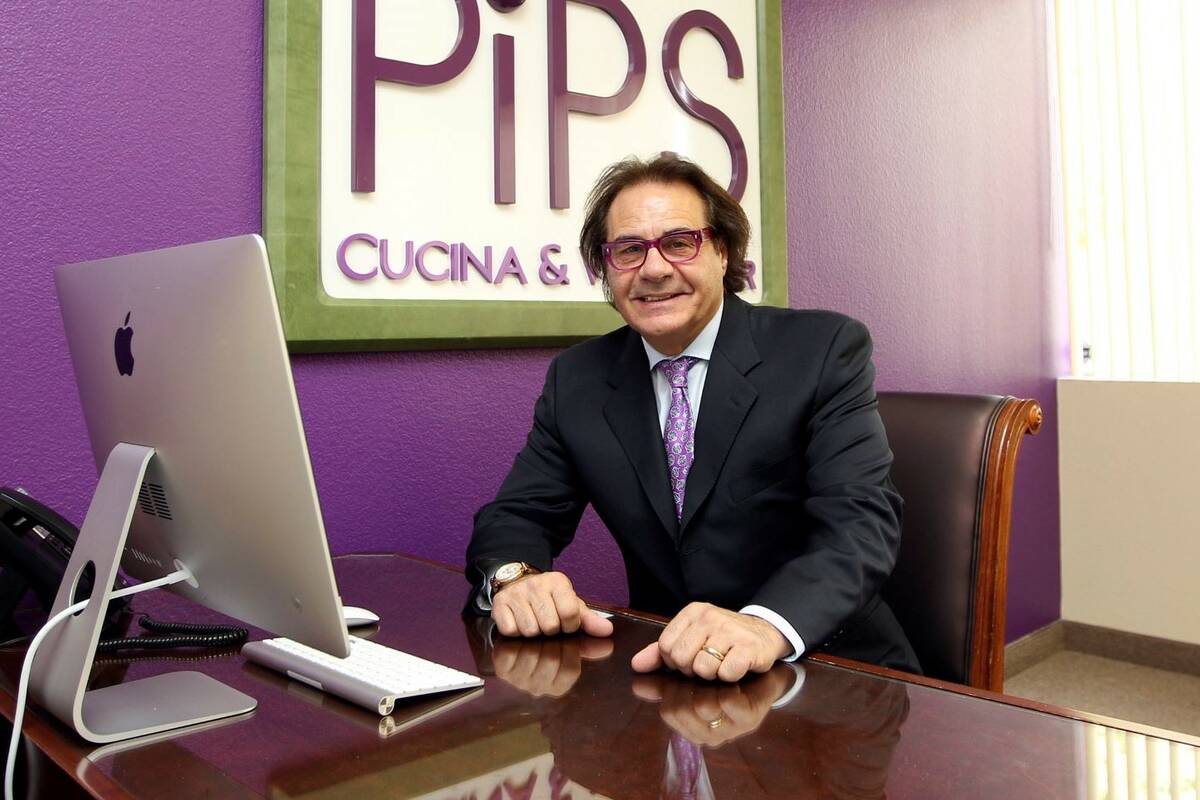 Rino Armeni poses in his business, Las Vegas Business Academy, Wednesday, Nov. 27, 2013. (Jerr ...