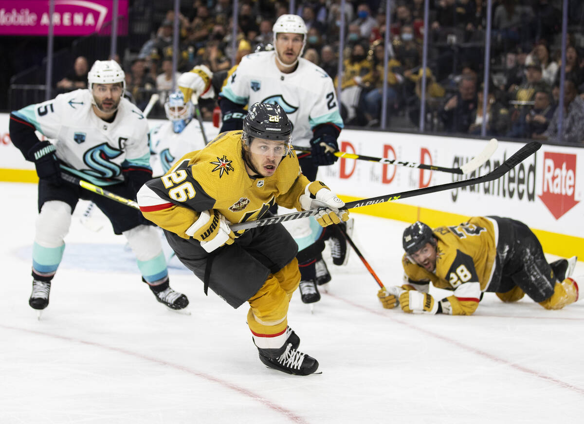 Vegas Golden Knights center Mattias Janmark (26) tracks a loose puck in the third period during ...