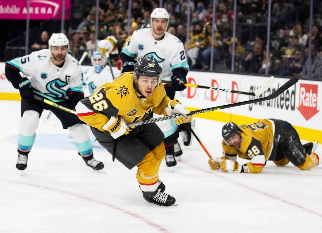 Vegas Golden Knights center Mattias Janmark (26) tracks a loose puck in the third period during ...