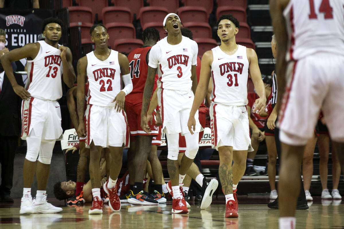 UNLV Rebels forward Donovan Williams (3) reacts after referees called a personal and technical ...