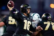 Purdue quarterback Aidan O'Connell (16) throws against Michigan State during the second half of ...