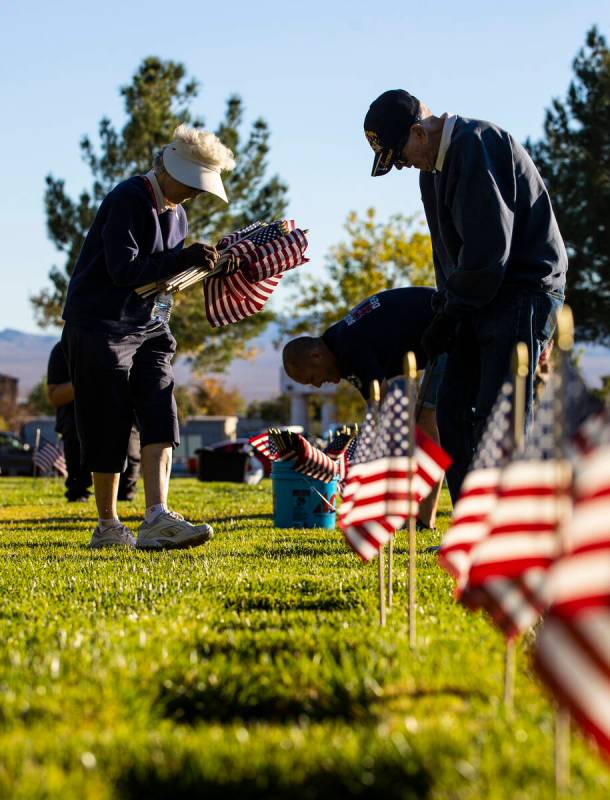 Vietnam Air Force veteran Sid OÕBrien, right and wife, Janet OÕBrien, place American ...