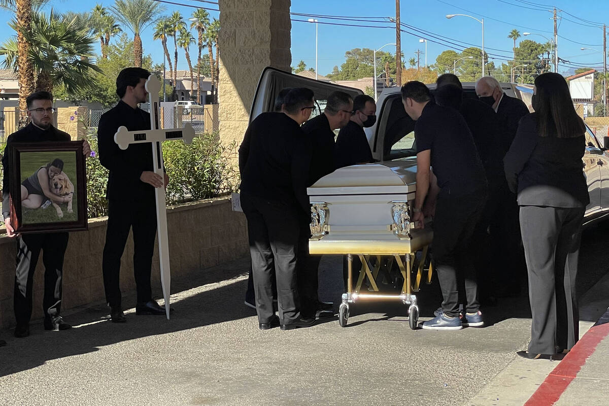 Pallbearers carry the casket of Tina Tintor outside St. Simeon Serbian Orthodox Church on Thurs ...