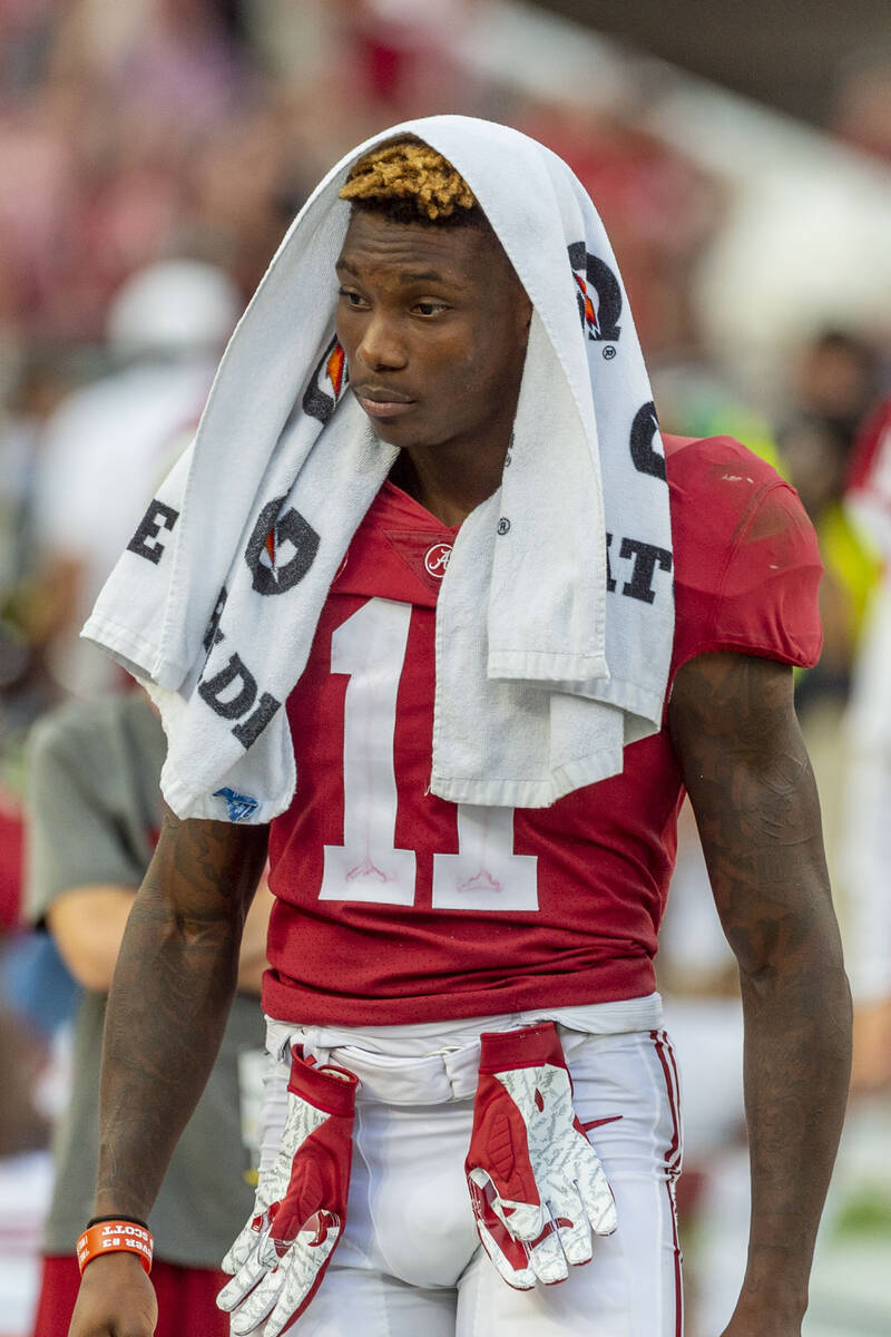 Alabama wide receiver Henry Ruggs III (11) walks the sidelines during the second half of an NCA ...