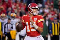 Kansas City Chiefs quarterback Patrick Mahomes throws during the second half of an NFL football ...