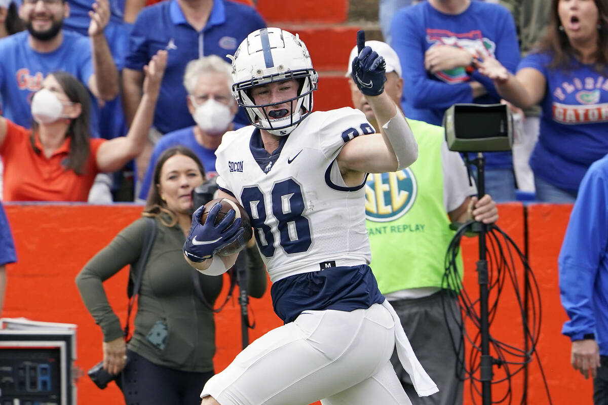 Samford tight end Michael Vice (88) celebrates as he heads to the end zone on a 58-yard pass pl ...