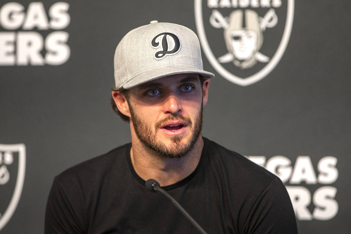 Raiders quarterback Derek Carr (4) answers questions during a news conference at Raiders headqu ...