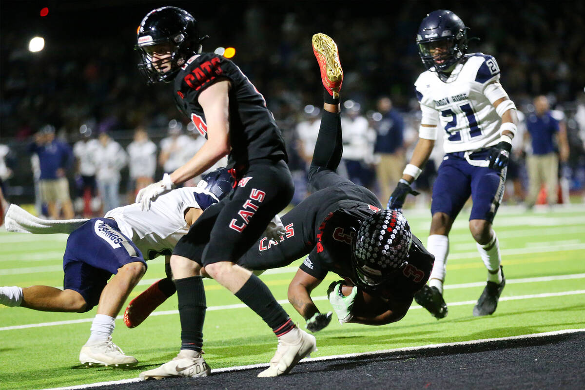 Las Vegas' Adonis Jackson (3) runs for a touchdown against Shadow Ridge in the second half of t ...