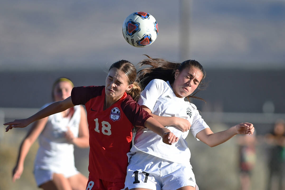 Coronado's Trinity Buchanan and Galena's Christin Huene go after a head shot during Friday's st ...