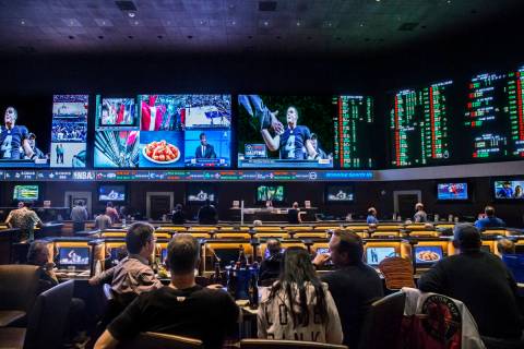 Customers watch games at The Race & Sports Book at Green Valley Ranch in November 2016 in Hende ...