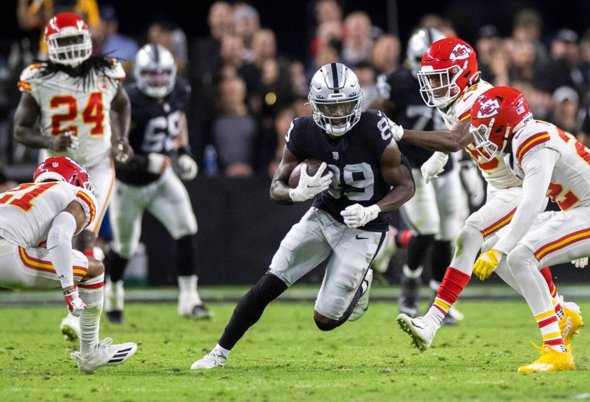 Raiders wide receiver Bryan Edwards (89) runs past Kansas City Chiefs safety Juan Thornhill (22 ...