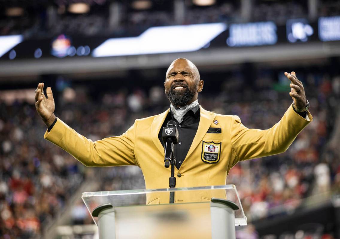 Raider Pro Football Hall of Fame inductee Charles Woodson speaks before the start of an NFL foo ...