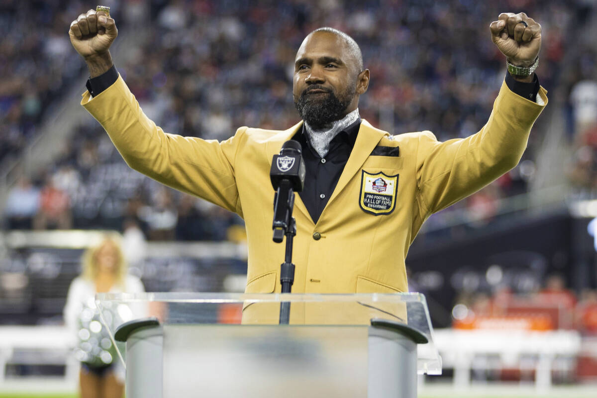 Raider Pro Football Hall of Fame inductee Charles Woodson speaks before the start of an NFL foo ...