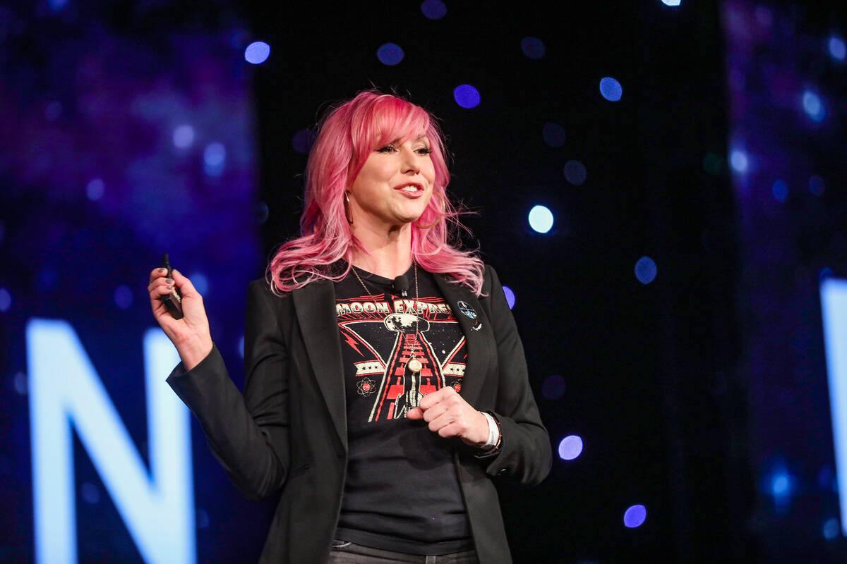 Moderator Kari Byron, from Mythbusters, addresses the crowd during a panel of citizen astronaut ...