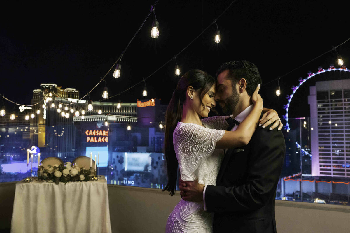 The Las Vegas skyline provides a romantic backdrop for a couple in this image from the LVCVA's ...