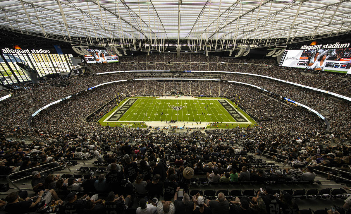 Fans fill the stands during an NFL football game between the Raiders and Baltimore Ravens at Al ...