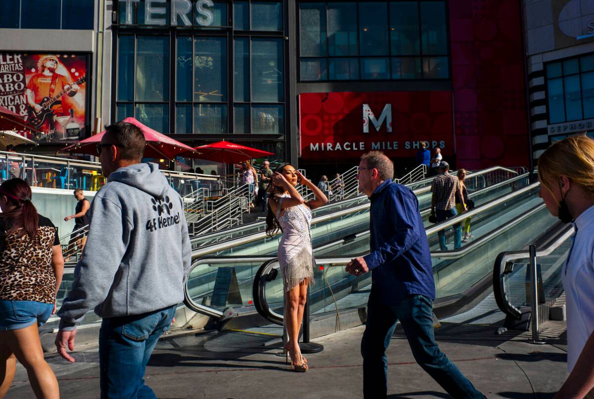 Miss Nevada USA Kataluna Enriquez, center, adjusts her hair during a promotional shoot, ahead o ...