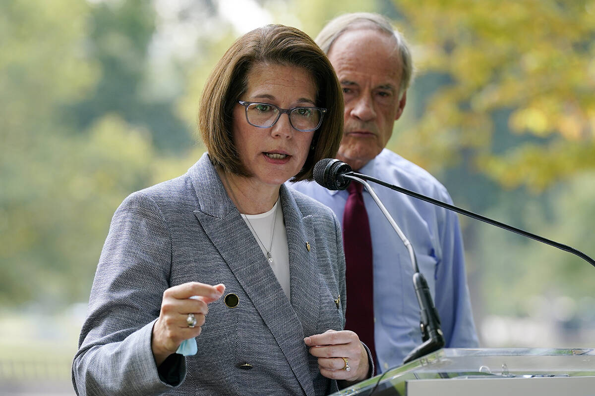 Sen. Catherine Cortez Masto, D-Nev., left, speaks alongside Sen. Tom Carper, D-Del., at a news ...