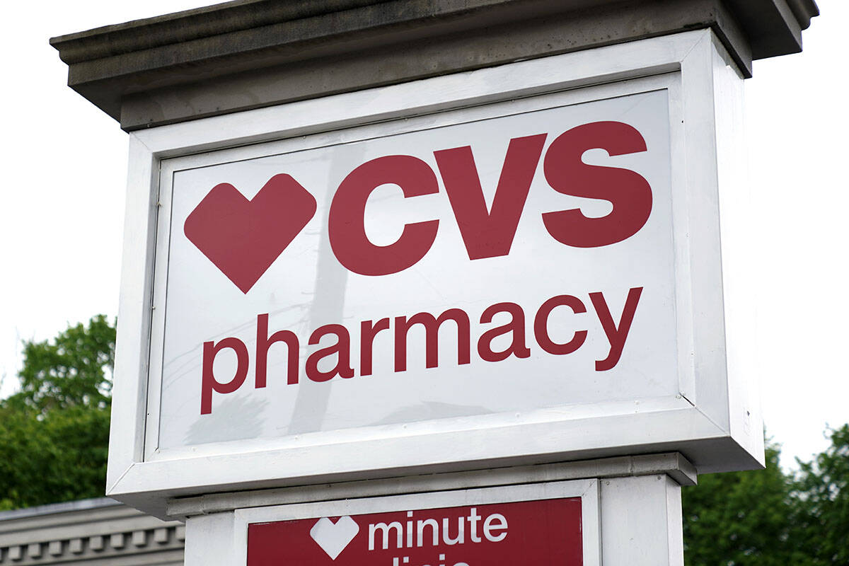 This is a CVS Pharmacy sign shown in Mount Lebanon, Pa., on Monday May 3, 2021. (AP Photo/Gene ...