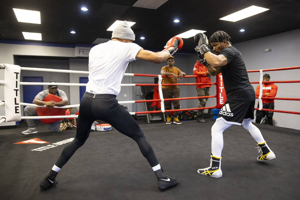 Shawn Porter, right, trains with Hendri Cedeño in preparation for an upcoming fight, at th ...