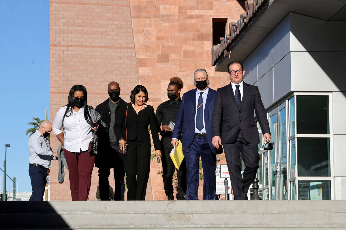 Henry Ruggs, third from right, walks out of the Regional Justice Center in Las Vegas on Monday, ...