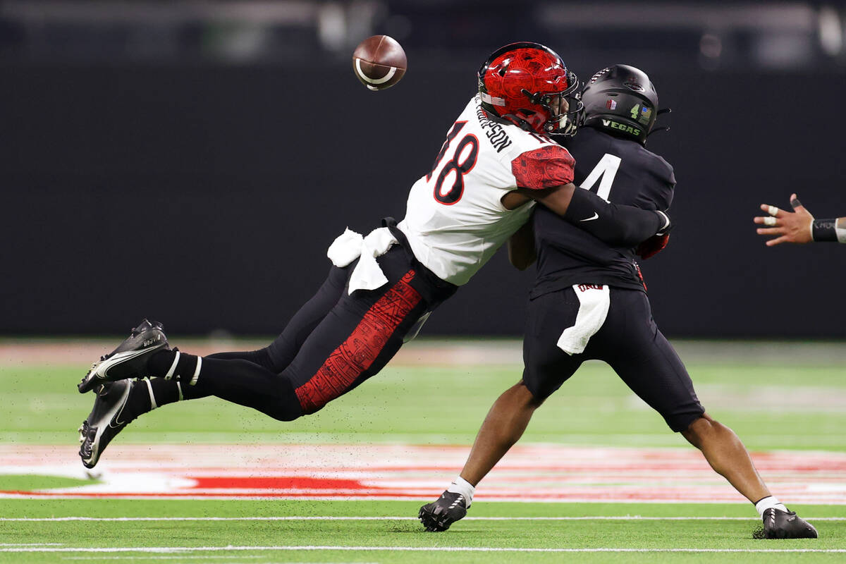 San Diego State Aztecs safety Trenton Thompson (18) forces an incomplete pass against UNLV Rebe ...