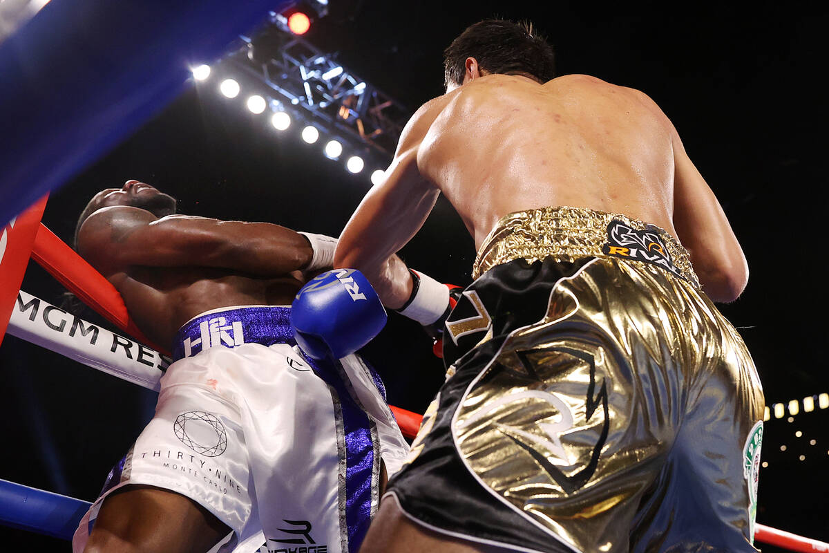 Janibek Alimkhanuly, right, fights Hassan N’Dam N’Jikam against the roped in the ...